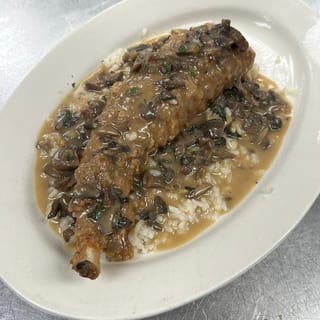 Stuffed Pork Chop Over Risotto